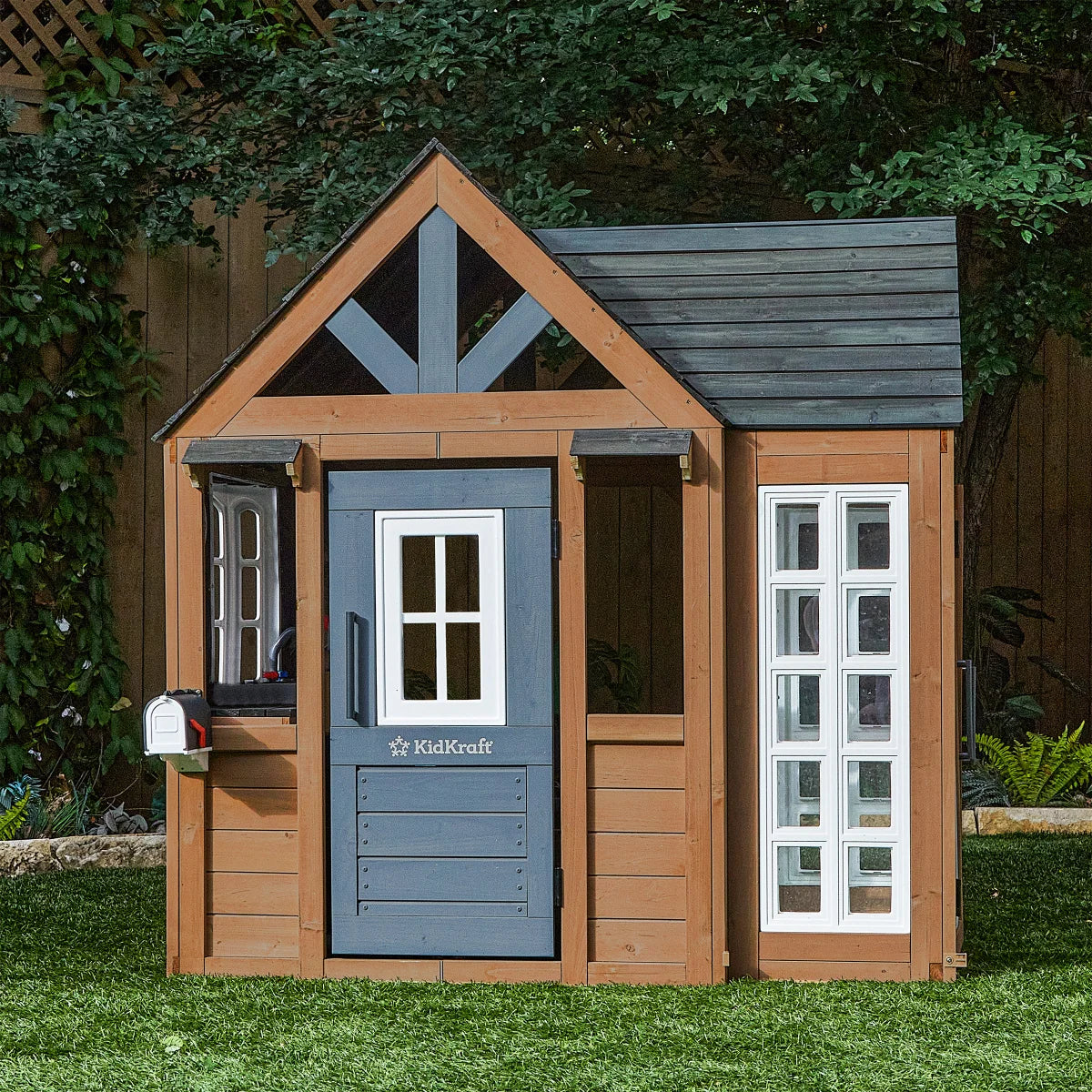 KidKraft Atrium Breeze Wooden Outdoor Playhouse with Sunroom & Play Kitchen